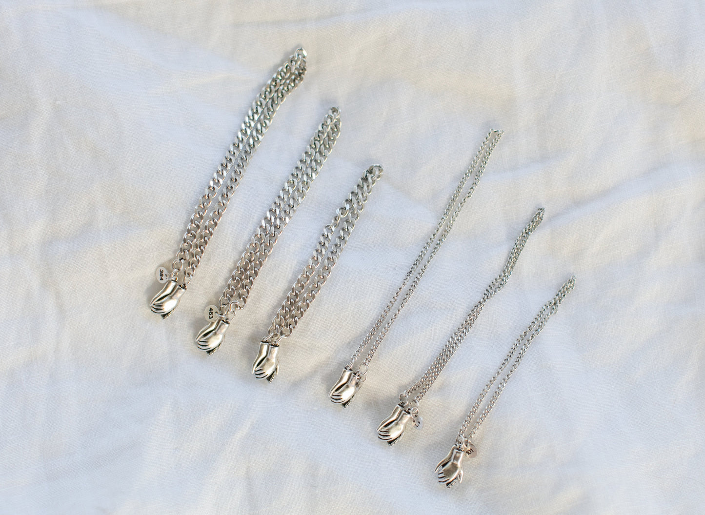the hand clasp  bracelet