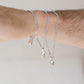 the hand clasp  bracelet