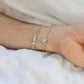 the hand clasp  bracelet